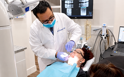 A dentist treating a patient