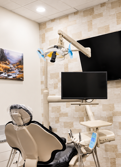 A treatment room with a dental chair