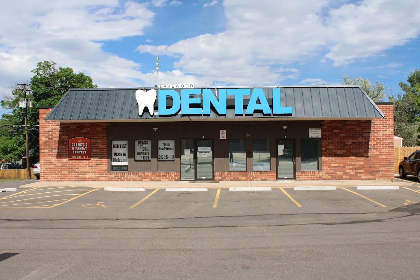A Lakewood Dental of Colorado dentist speaking with a patient